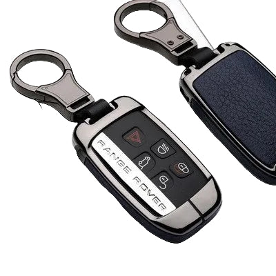 Blue leather Range Rover-style car key fob with metal keychain attachment placed on a white surface