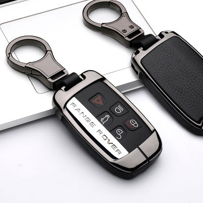 Black leather-shell Range Rover style key fob shown with metallic gun-finish keychain attachment on a clean white background