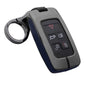 Blue leather-shell Range Rover–style key fob with metallic gun-finish keychain attachment displayed on a clean white background